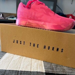 Brand new No Bull pink shoes. Never worn, comfortable and affordable.